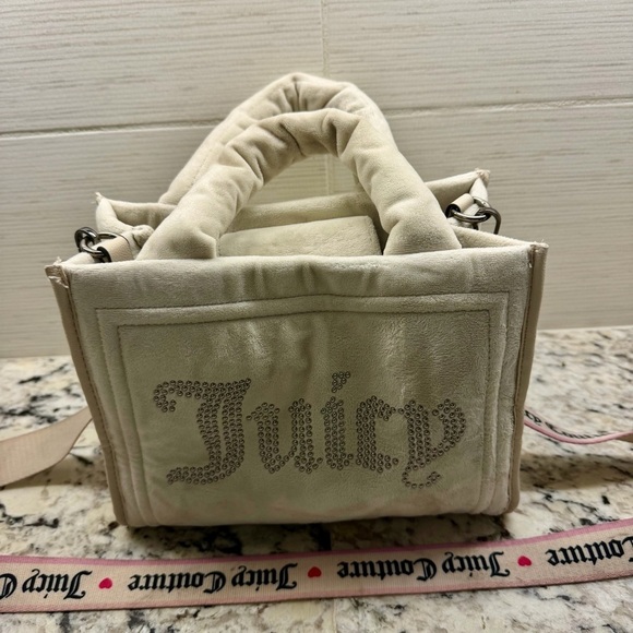 Juicy Couture Handbags - Juicy Couture beige Mini Bag